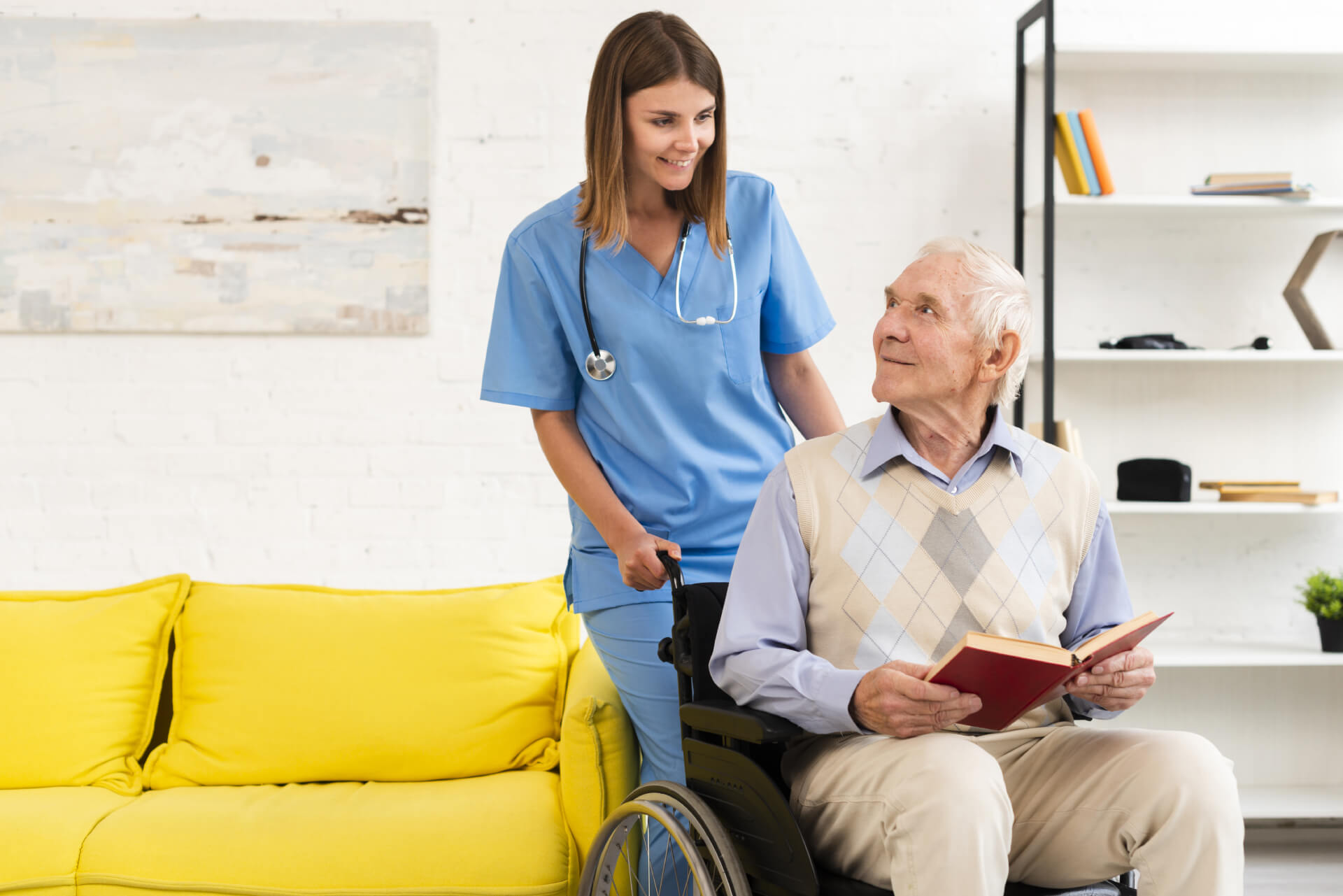 old-man-sitting-wheelchair-while-talking-nurse (1) (1)